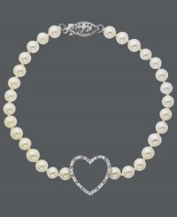 Put your heart on the line. This romantic style features a sweet strand of cultured freshwater pearls (4-1/2 mm) and a diamond-covered, cut-out heart pendant (1/10 ct. t.w.). Approximate length: 16 inches. Approximate drop: 1/2 inch.