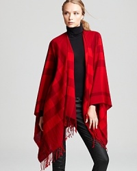 Bold red hues in an oversized Burberry check keep you warm and stylish. Bold red hues in an oversized Burberry check keep you warm and stylish.