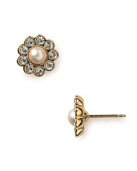 Channel your inner lady who luxes in kate spade new york's gold-plated pearl earrings. During the day, these delicate studs go to lunch with a boucle suit and structured handbag. Channel your inner lady who luxes in kate spade new york's gold-plated pearl earrings. During the day, these delicate studs go to lunch with a boucle suit and structured handbag.