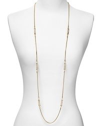 Channel this season's flair for the dramatic with MICHAEL Michael Kors' dangly necklace. Day or after dark, this delicate design brings a touch of sparkle. Channel this season's flair for the dramatic with MICHAEL Michael Kors' dangly necklace. Day or after dark, this delicate design brings a touch of sparkle.