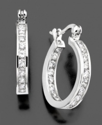 A classic way to lend sparkle to any outfit. These graceful hoop earrings by B. Brilliant feature round-cut cubic zirconia (2-1/3 ct. t.w.) along its length. Measures approximately 1/2 inches in diameter. A classic way to lend sparkle to any outfit. These graceful hoop earrings by B. Brilliant feature round-cut cubic zirconia (2-1/3 ct. t.w.) along its length. Measures approximately 1/2 inches in diameter.