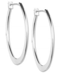 Big-time fashion. Anne Klein's oval-shaped hoops are a must-own this season. Crafted in imitation rhodium-plated mixed metal. Approximate diameter: 3/4 inch. Big-time fashion. Anne Klein's oval-shaped hoops are a must-own this season. Crafted in imitation rhodium-plated mixed metal. Approximate diameter: 3/4 inch.