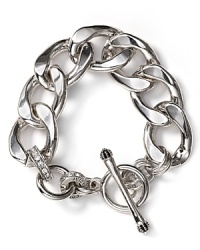 Charmed we're sure. Juicy Couture hits the links with this bold bracelet, crafted of plated metal and accented by a classic ring and toggle closure. Charmed we're sure. Juicy Couture hits the links with this bold bracelet, crafted of plated metal and accented by a classic ring and toggle closure.
