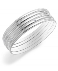 Shine on! Add an eye-catching element to your wardrobe with this stylish set of five bangle bracelets from Charter Club. Made in silver tone mixed metal, they'll look equally chic worn together or individually. Approximate diameter: 2-1/2 inches. Item comes packaged in a signature gift box. Shine on! Add an eye-catching element to your wardrobe with this stylish set of five bangle bracelets from Charter Club. Made in silver tone mixed metal, they'll look equally chic worn together or individually. Approximate diameter: 2-1/2 inches. Item comes packaged in a signature gift box.
