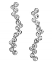 Timeless, feminine and graceful. Swarovski's rhodium-plated pierced earrings present a beautiful, fluid silhouette in sparkling clear crystal pavé. Set in mixed metal. Approximate drop: 1-5/8 inches. Timeless, feminine and graceful. Swarovski's rhodium-plated pierced earrings present a beautiful, fluid silhouette in sparkling clear crystal pavé. Set in mixed metal. Approximate drop: 1-5/8 inches.