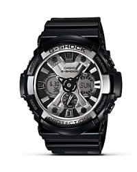 Designed for maximum performance and style, this digital watch from G-Shock - with a 200 meter water resistance, stopwatch, and multiple alarms - has the look you want and the features you need. Designed for maximum performance and style, this digital watch from G-Shock - with a 200 meter water resistance, stopwatch, and multiple alarms - has the look you want and the features you need.