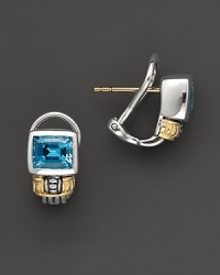 A simply elegant touch for your casual or dressy ensemble, blue topaz earrings with filigree sterling silver casing and goldtone accents. Designed by Lagos. A simply elegant touch for your casual or dressy ensemble, blue topaz earrings with filigree sterling silver casing and goldtone accents. Designed by Lagos.