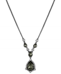 Front and center in fashion. Givenchy shines with this Y-shaped necklace crafted from hematite-tone mixed metal with glass stones adorning it. The pendant glistens with cubic zirconia accents. Approximate length: 16 inches + 2-inch extender. Front and center in fashion. Givenchy shines with this Y-shaped necklace crafted from hematite-tone mixed metal with glass stones adorning it. The pendant glistens with cubic zirconia accents. Approximate length: 16 inches + 2-inch extender.