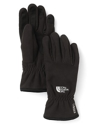 Beat the chill with these cozy fleece gloves from The North Face® featuring cinching at the wrist and palm and fingertip patches. Beat the chill with these cozy fleece gloves from The North Face® featuring cinching at the wrist and palm and fingertip patches.