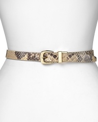 Make last-minute wardrobe changes a cinch with this MICHAEL Michael Kors reversible belt, perfecting double duty from smooth to python-embossed leather. Make last-minute wardrobe changes a cinch with this MICHAEL Michael Kors reversible belt, perfecting double duty from smooth to python-embossed leather.