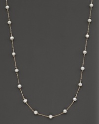Beaded 14 Kt. white gold necklace with fresh water pearl stations. Beaded 14 Kt. white gold necklace with fresh water pearl stations.