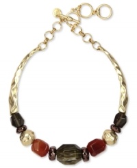 Drape you neckline in warm tones. Jones New York's collar necklace boasts multi-colored resin beads on a textured surface. Crafted in worn gold tone mixed metal. Approximate length: 17 inches + 3-inch extender. Drape you neckline in warm tones. Jones New York's collar necklace boasts multi-colored resin beads on a textured surface. Crafted in worn gold tone mixed metal. Approximate length: 17 inches + 3-inch extender.