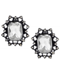 Burst onto the scene with this pair of stud earrings from Betsey Johnson. Crafted from black-plated mixed metal, the earrings glisten with glass crystal accents and feature a bold filigree pattern. Approximate drop: 3/4 inch.