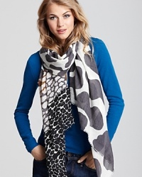 Sky's the limit in this DIANE von FURSTENBERG oblong scarf, printed with muted black floating clouds. Sky's the limit in this DIANE von FURSTENBERG oblong scarf, printed with muted black floating clouds.