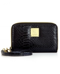 Add posh yet practical style to your accessorizing with this fab cell phone wristlet from Style&co. Chic croc-embossed pattern and signature hardware adorn the outside, while the well-organized interior discretely stows phone, cards, cash and fave lip gloss. Add posh yet practical style to your accessorizing with this fab cell phone wristlet from Style&co. Chic croc-embossed pattern and signature hardware adorn the outside, while the well-organized interior discretely stows phone, cards, cash and fave lip gloss.