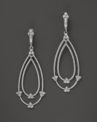 Eloquently shaped, these sterling silver earrings from Judith Ripka are accented with white sapphires. Eloquently shaped, these sterling silver earrings from Judith Ripka are accented with white sapphires.