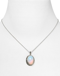 A classically glam look from Judith Jack. Glittering crystals frame a large opal stone with luminescent milky depth - the perfect pendant for chiffon with a plunging neckline. A classically glam look from Judith Jack. Glittering crystals frame a large opal stone with luminescent milky depth - the perfect pendant for chiffon with a plunging neckline.