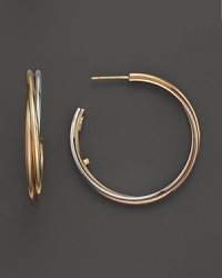 Classic hoop earrings in 18K yellow, white and rose gold. From Roberto Coin. Classic hoop earrings in 18K yellow, white and rose gold. From Roberto Coin.