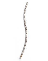 Crislu's round cut tennis bracelet is exactly what she wants this year. Simple chic with understated glamour is perfect for day or evening parties. Crislu's round cut tennis bracelet is exactly what she wants this year. Simple chic with understated glamour is perfect for day or evening parties.