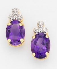 Couple cool amethyst with glittering diamonds to make her February birthday - or any event - special. Multifaceted oval-cut amethyst are crowned with round-cut diamond accents and set in 14k gold. For pierced ears only. Couple cool amethyst with glittering diamonds to make her February birthday - or any event - special. Multifaceted oval-cut amethyst are crowned with round-cut diamond accents and set in 14k gold. For pierced ears only.