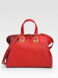 A structured silhouette of paneled leather in contrasting tones, finished with polished hardware. Double top handles, 5 dropAdjustable detachable shoulder strap, 17-24 dropTop zip closureProtective metal feetTwo inside open pocketsFully lined15W X 11½H X 7DMade in Italy A structured silhouette of paneled leather in contrasting tones, finished with polished hardware. Double top handles, 5 dropAdjustable detachable shoulder strap, 17-24 dropTop zip closureProtective metal feetTwo inside open pocketsFully lined15W X 11½H X 7DMade in Italy