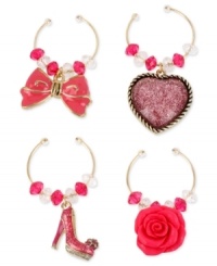 Party pleaser. You'll never lose your wine glasses in a crowd with this four-piece charm set from Betsey Johnson. Crafted from gold-tone mixed metal, and featuring whimsical designs and glittery glass accents. Items come packaged in a signature Betsey Johnson Gift Box. Approximate drop, shoe charm: 1 inch; heart charm: 1 inch; flower charm: 3/4 inch; bow charm: 3/4 inch. Party pleaser. You'll never lose your wine glasses in a crowd with this four-piece charm set from Betsey Johnson. Crafted from gold-tone mixed metal, and featuring whimsical designs and glittery glass accents. Items come packaged in a signature Betsey Johnson Gift Box. Approximate drop, shoe charm: 1 inch; heart charm: 1 inch; flower charm: 3/4 inch; bow charm: 3/4 inch.