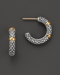Sterling silver small caviar hoop earring with 18 Kt. accents. Designed by Lagos. Sterling silver small caviar hoop earring with 18 Kt. accents. Designed by Lagos.