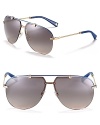 Chic rimless aviator sunglasses get a pop of color along top bar and arms for eye-catching style.