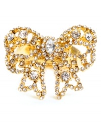 Adorn your digits with style that shines. Betsey Johnson's intricate bow ring is decorated with dozens of flashy clear crystals. Set in gold tone mixed metal. Ring stretches to fit finger. Adorn your digits with style that shines. Betsey Johnson's intricate bow ring is decorated with dozens of flashy clear crystals. Set in gold tone mixed metal. Ring stretches to fit finger.