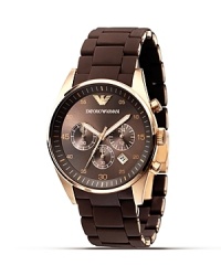 Sporty and sophisticated, this rugged Armani watch is coated with tonal rubber and features a stunning rose gold accents and time and date display. Sporty and sophisticated, this rugged Armani watch is coated with tonal rubber and features a stunning rose gold accents and time and date display.