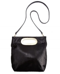 Go bold with this daring snakeskin crossbody from MICHAEL Michael Kors. This wildly haute look features shiny 18K gold hardware and modern cut-out handles at sides. Go bold with this daring snakeskin crossbody from MICHAEL Michael Kors. This wildly haute look features shiny 18K gold hardware and modern cut-out handles at sides.