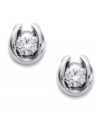 Complement any look with a little sparkle. Sirena's pretty stud earrings feature a 14k white gold bezel setting with round-cut diamonds inside (1/7 ct. t.w.). Approximate diameter: 3/4 inch. Complement any look with a little sparkle. Sirena's pretty stud earrings feature a 14k white gold bezel setting with round-cut diamonds inside (1/7 ct. t.w.). Approximate diameter: 3/4 inch.