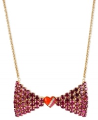 Tie it, you'll love it. This necklace from Betsey Johnson is crafted from gold-tone mixed metal with a bow pendant adorned with fuchsia glass crystal accents and a heart in the center. Approximate length: 16 inches + 3-inch extender. Approximate drop: 2 inches. Tie it, you'll love it. This necklace from Betsey Johnson is crafted from gold-tone mixed metal with a bow pendant adorned with fuchsia glass crystal accents and a heart in the center. Approximate length: 16 inches + 3-inch extender. Approximate drop: 2 inches.