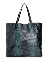 Effortlessly exotic, this python-embossed print tote from GUESS adds edginess to an everyday classic. The shoulder-right shape is accented with subtle signature hardware, while the generous interior fits much more than just the essentials. Effortlessly exotic, this python-embossed print tote from GUESS adds edginess to an everyday classic. The shoulder-right shape is accented with subtle signature hardware, while the generous interior fits much more than just the essentials.