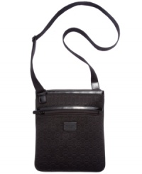Gussy up your gadget with signature style with this cool tech case from MICHAEL Michael Kors. Super-soft neoprene is embossed with the iconic MK monogram, while the convenient crossbody strap adds on-the-go ease. Gussy up your gadget with signature style with this cool tech case from MICHAEL Michael Kors. Super-soft neoprene is embossed with the iconic MK monogram, while the convenient crossbody strap adds on-the-go ease.