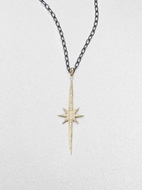 A dazzling diamond encrusted 14k gold starburst on a blackened sterling silver twisted link chain. Blackened sterling silverDiamonds, .3 tcw14k goldLength, about 16Pendant size, about 2Lobster clasp closureMade in USA A dazzling diamond encrusted 14k gold starburst on a blackened sterling silver twisted link chain. Blackened sterling silverDiamonds, .3 tcw14k goldLength, about 16Pendant size, about 2Lobster clasp closureMade in USA
