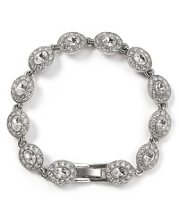 Embellished with crystals, Carolee's stone bracelet sparkles with day-to-night appeal. Wear this extra with a white blouse to elevate a tailored look--cuff the sleeves for maximum shine. Embellished with crystals, Carolee's stone bracelet sparkles with day-to-night appeal. Wear this extra with a white blouse to elevate a tailored look--cuff the sleeves for maximum shine.
