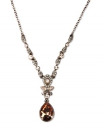 Perfect sparkle for any occasion. This Givenchy Y necklace flaunts rich hues with silk Swarovski stone pendants and accents. Crafted in brown gold tone mixed metal. Approximate length: 16 inches. Approximate drop: 1-3/4 inches. Perfect sparkle for any occasion. This Givenchy Y necklace flaunts rich hues with silk Swarovski stone pendants and accents. Crafted in brown gold tone mixed metal. Approximate length: 16 inches. Approximate drop: 1-3/4 inches.