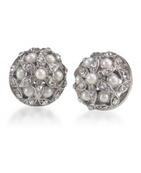 Sweet and sublime, earrings that offer a refreshing twist to your average stud. Created by Carolee, these intricate stud earrings feature a crafty pattern of white glass pearls and glass crystals. Set in silvertone mixed metal. Surgical steel posts. Approximate diameter: 1/2 inch. Sweet and sublime, earrings that offer a refreshing twist to your average stud. Created by Carolee, these intricate stud earrings feature a crafty pattern of white glass pearls and glass crystals. Set in silvertone mixed metal. Surgical steel posts. Approximate diameter: 1/2 inch.