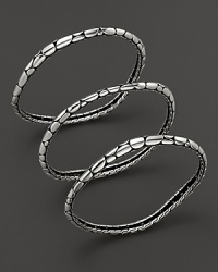 Slender, pebbled sterling bangles are just perfect for stacking--or wear one for a striking statement. Slender, pebbled sterling bangles are just perfect for stacking--or wear one for a striking statement.