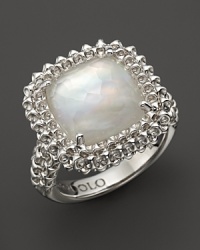 A bold sterling silver ring, gleaming with a rock crystal over Mother-of-pearl doublet, showcases Di MODOLO's unique Triadra cages. A bold sterling silver ring, gleaming with a rock crystal over Mother-of-pearl doublet, showcases Di MODOLO's unique Triadra cages.