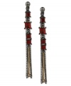 This pair of earrings from Kenneth Cole New York is sure to cause a chain reaction of excitement. Crafted from gold- and hematite-tone mixed metal and adorned with red and glass crystal accents, the earrings make a bold statement. Approximate drop: 3 inches.