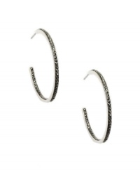 Get glamorous hoops with a little extra glimmer. Judith Jack earrings feature a 3/4 hoop decorated with marcasite. Crafted in sterling silver. Approximate diameter: 1 inch. Get glamorous hoops with a little extra glimmer. Judith Jack earrings feature a 3/4 hoop decorated with marcasite. Crafted in sterling silver. Approximate diameter: 1 inch.