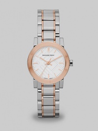 In a subtle reference to those beloved Burberry checks, this elegant stainless steel timepiece has a patterned face and warm rose goldplated accents.Quartz movementWater resistant to 5 ATMStainless steel round case with IP rose goldplated accents, 26mm diameter (1)Polished bezelSapphire crystalCheck-pattern white dialRose goldplated bar hour markersSecond handTwo-tone link bracelet with fold over buckleMade in Switzerland In a subtle reference to those beloved Burberry checks, this elegant stainless steel timepiece has a patterned face and warm rose goldplated accents.Quartz movementWater resistant to 5 ATMStainless steel round case with IP rose goldplated accents, 26mm diameter (1)Polished bezelSapphire crystalCheck-pattern white dialRose goldplated bar hour markersSecond handTwo-tone link bracelet with fold over buckleMade in Switzerland