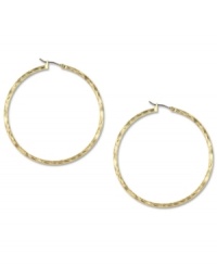 Hints of subtle texture create a look that's modern and elegant on these Jones New York hoop earrings. Crafted in gold tone mixed metal. Approximate drop: 3/4 inch. Hints of subtle texture create a look that's modern and elegant on these Jones New York hoop earrings. Crafted in gold tone mixed metal. Approximate drop: 3/4 inch.