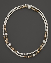 A shimmering mix of mother-of-pearl, rutilated quartz and cultured freshwater pearls. A shimmering mix of mother-of-pearl, rutilated quartz and cultured freshwater pearls.