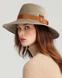 Turn heads in this chic statement piece: Helen Kaminski brings you everyday elegance in a posh rabbit fur hat with Italian grosgrain trim. Turn heads in this chic statement piece: Helen Kaminski brings you everyday elegance in a posh rabbit fur hat with Italian grosgrain trim.