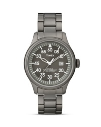 Iconic American watchmaker, Timex puts a vintage spin on this plated gunmetal watch with a surplus styled dial, complemented by a simple link bracelet. Iconic American watchmaker, Timex puts a vintage spin on this plated gunmetal watch with a surplus styled dial, complemented by a simple link bracelet.
