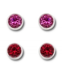 Bright idea: Add a playful pop of color to your look with Swarovski's stylish set of vibrant crystal stud earrings. Featuring colored crystals in fuchsia and red, they're set in silver tone mixed metal. Approximate diameter: 2/10 inch. Bright idea: Add a playful pop of color to your look with Swarovski's stylish set of vibrant crystal stud earrings. Featuring colored crystals in fuchsia and red, they're set in silver tone mixed metal. Approximate diameter: 2/10 inch.