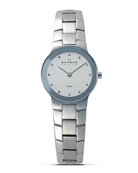 The links make the watch on this Skagen design. Slim round case envelops a vertically brushed chrome dial. Swarovski crystal hour indices add sparkle. Finished with a bold stainless steel bracelet strap. The links make the watch on this Skagen design. Slim round case envelops a vertically brushed chrome dial. Swarovski crystal hour indices add sparkle. Finished with a bold stainless steel bracelet strap.